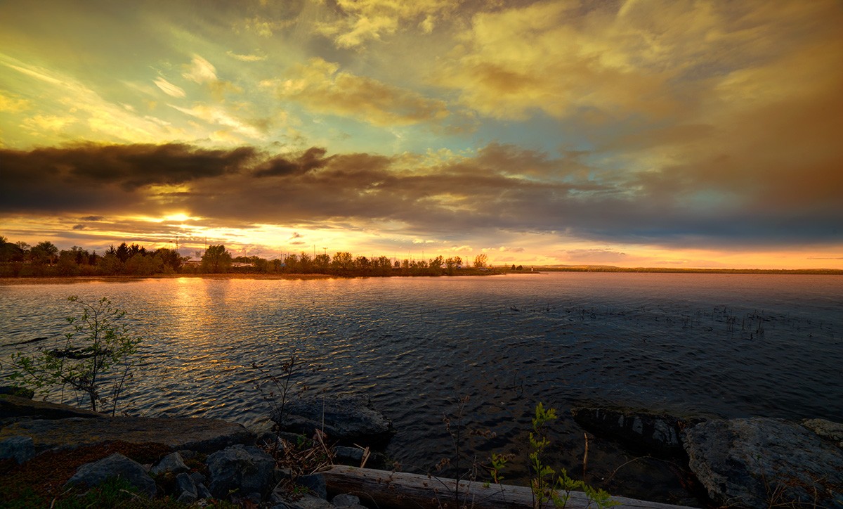 I walk along the river