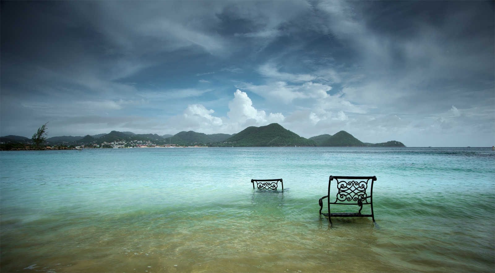 two chairs in the sea