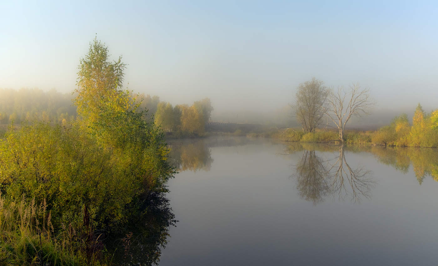 Плыл над озером туман
