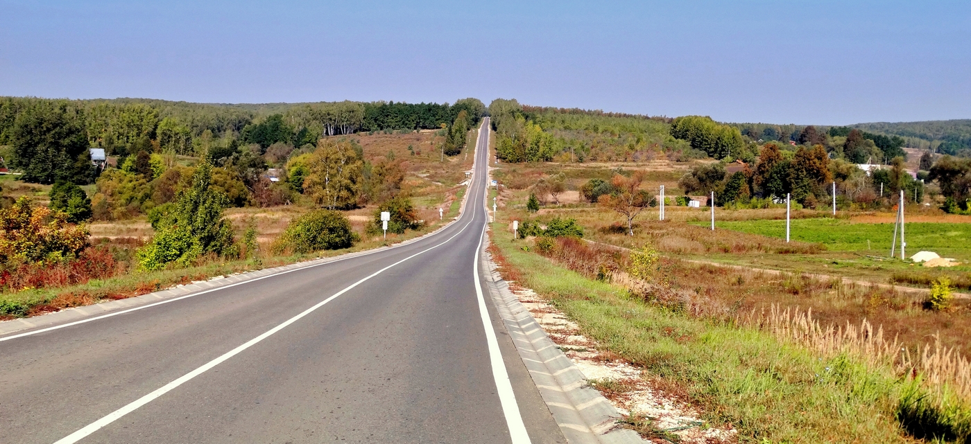 Дорога сквозь осень за горизонт